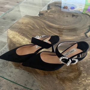 Jimmy Choo Black suede leather mules with rhinestone buckle.